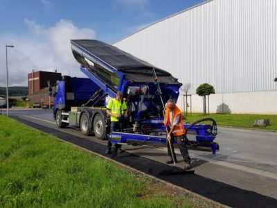 distributor asfaltu sprider v akci